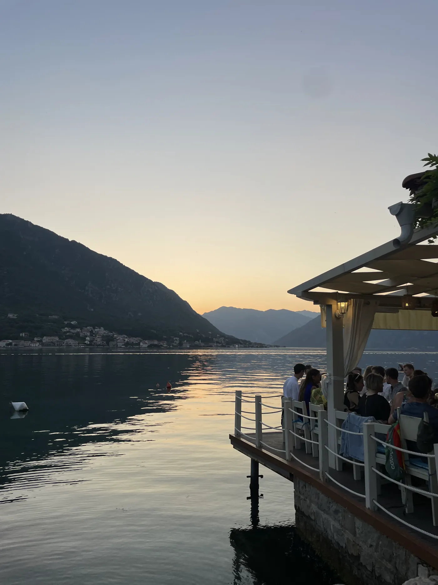 A dock on the Bay of Kotor at sunset
