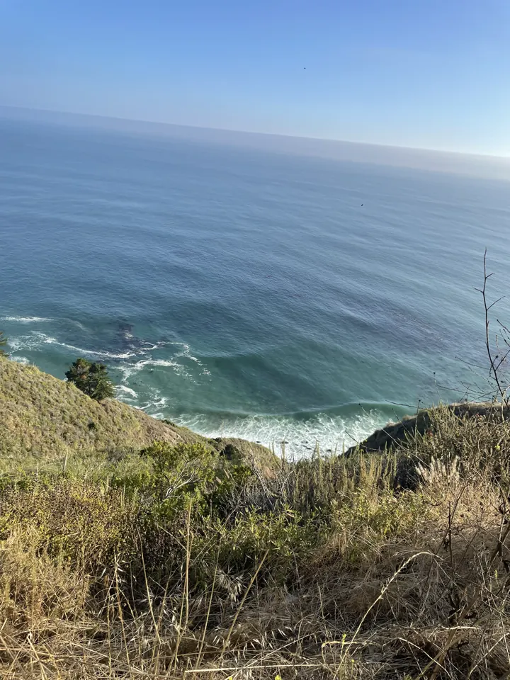 Grassy bluffs above the deep blue Pacific along the Big Sur coast