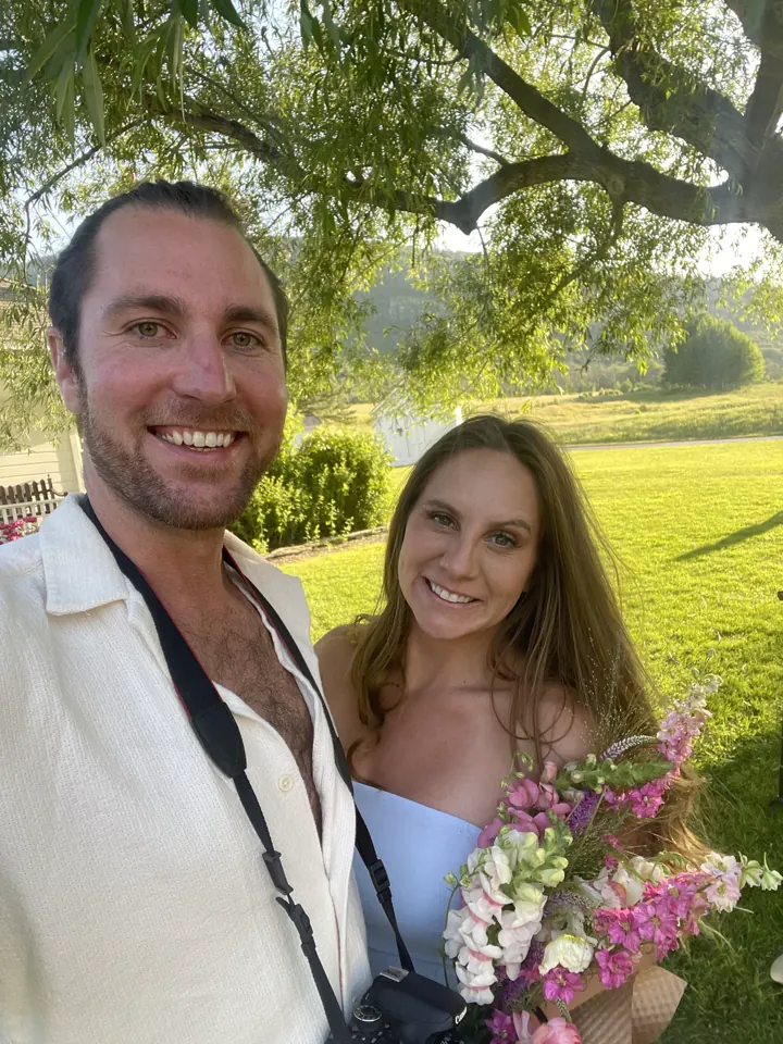 A pregnancy photo shoot in a wildflower meadow in Park City