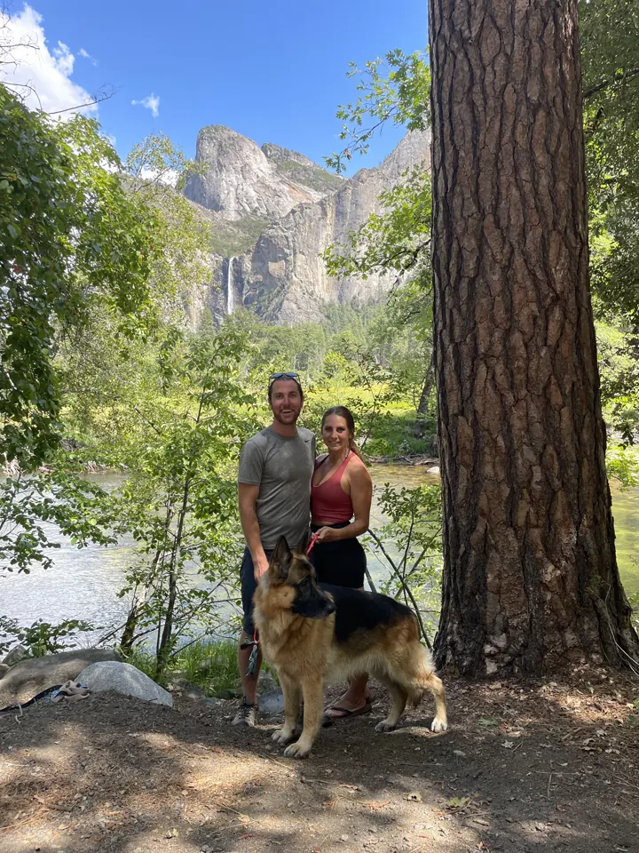 Colin, Angela and Jack under a big pine with Yosemite Falls behind them