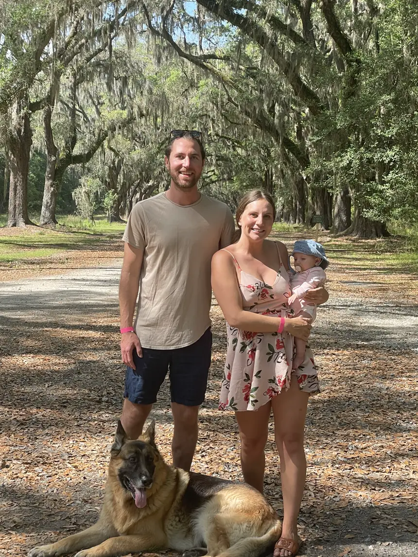 Colin, Angela, Andi and our German Shepherd under the live oaks