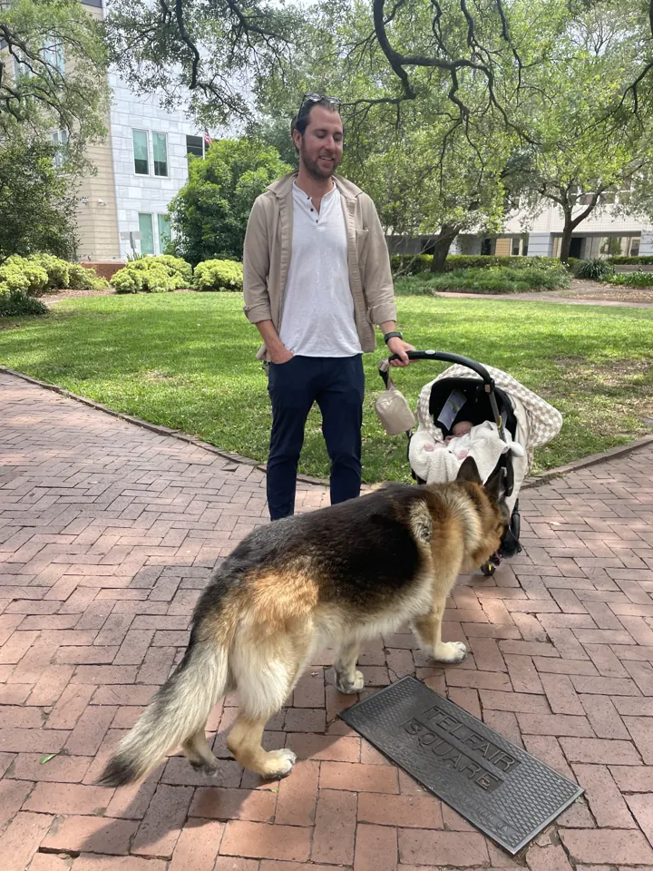 Colin with our dog in one of Savannah's squares