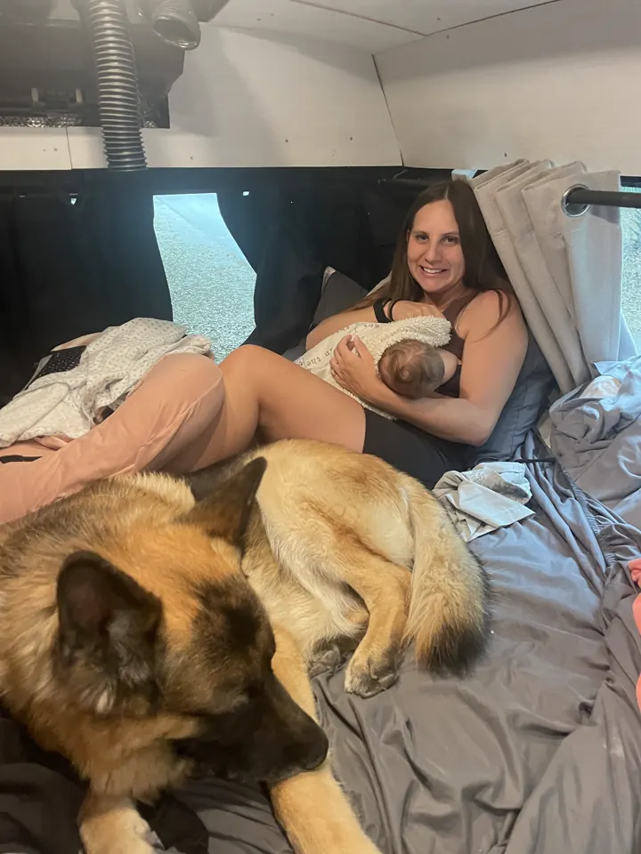 Angela, Andi and our dog resting in the van