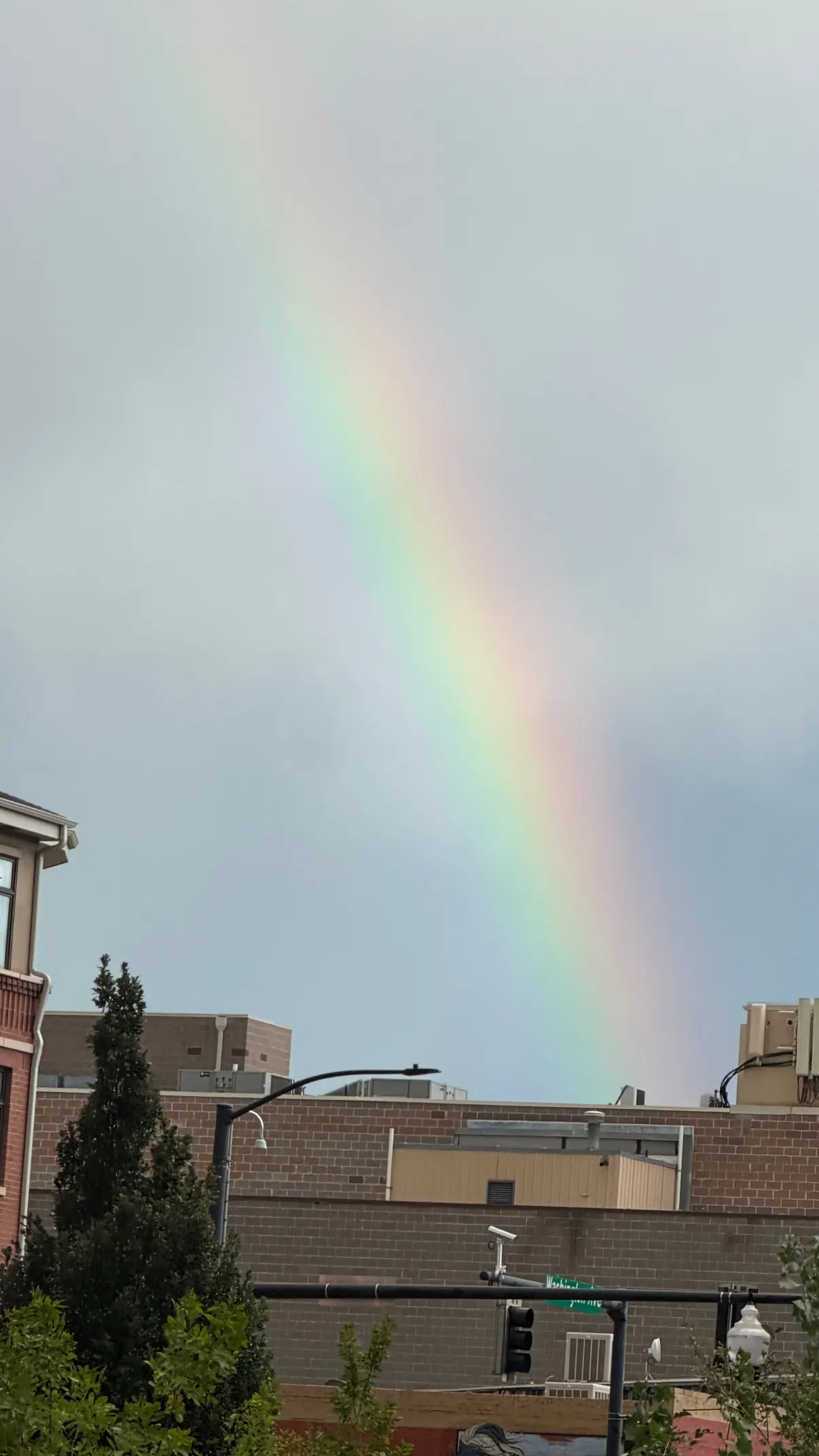 A rainbow over a Denver neighborhood