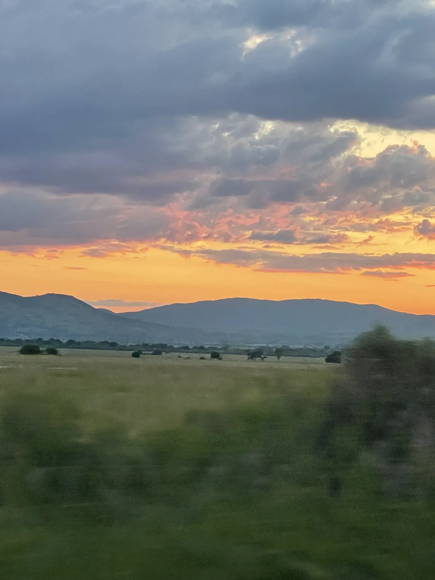 Sunset over fields on the drive inland toward Plitvice