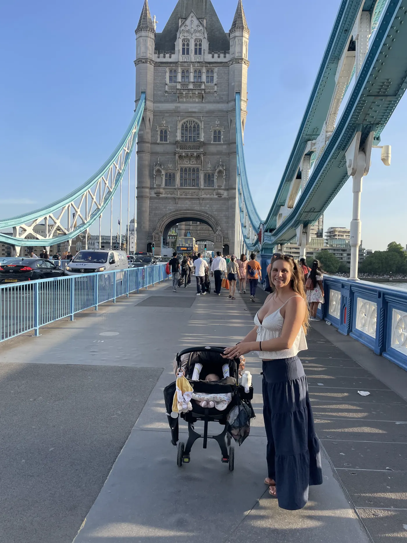 Angela pushing Andi's stroller across Tower Bridge in London