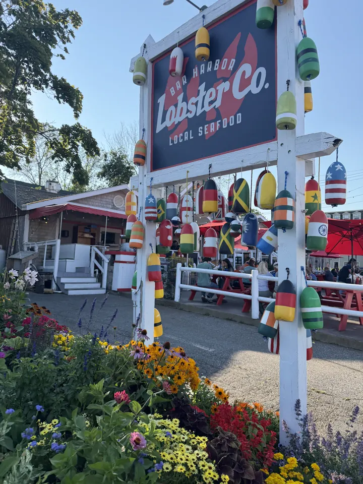 A colorful lobster company sign in Bar Harbor