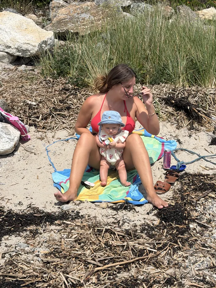 Mom and baby on the sand at Hendricks Head Beach