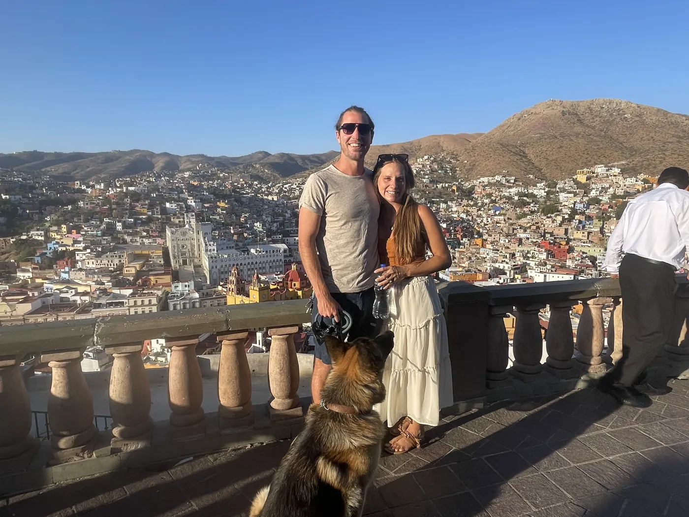 Colin and Angela with Jack, our German Shepherd, at a stone overlook above Guanajuato