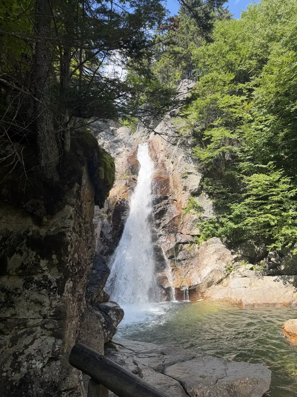 A waterfall tumbling down a rock face in the White Mountains